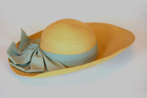 Straw hat with ribbon in hat collection