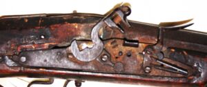 close up picture of the English lock on the musket