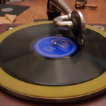 Vinyl record on old Victrola turntable with needle arm