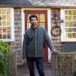 Picture of Lee McColgan in front of historic house