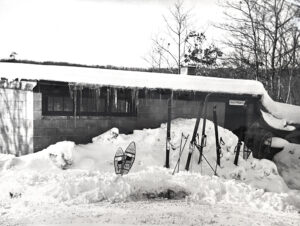 Old building surrounded by snow