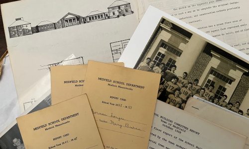 Documents from a folder laid out on a table